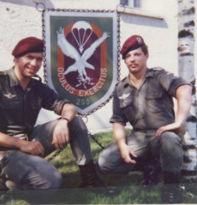 Soldiers from Fernspähkompanie 200 posing in front of unit sign on Argonnen Kaserne, Weingarten